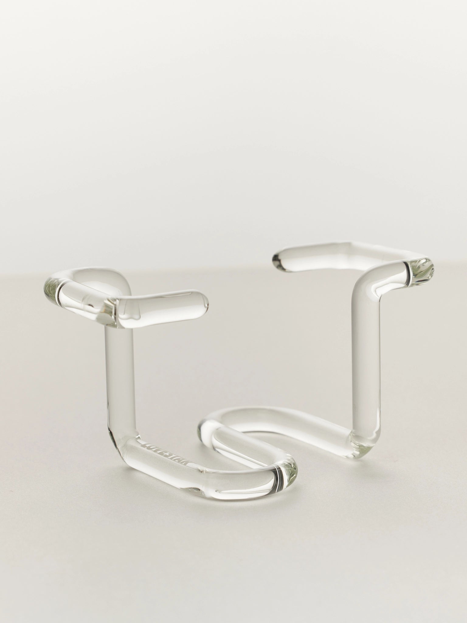 Clear glass vase stand on a white background